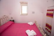 camera-il-ciliegio-letto-camera-matrimoniale-vista-finestra