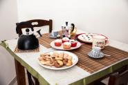 camera-il-mandorlo-tavolo-imbandito-colazione